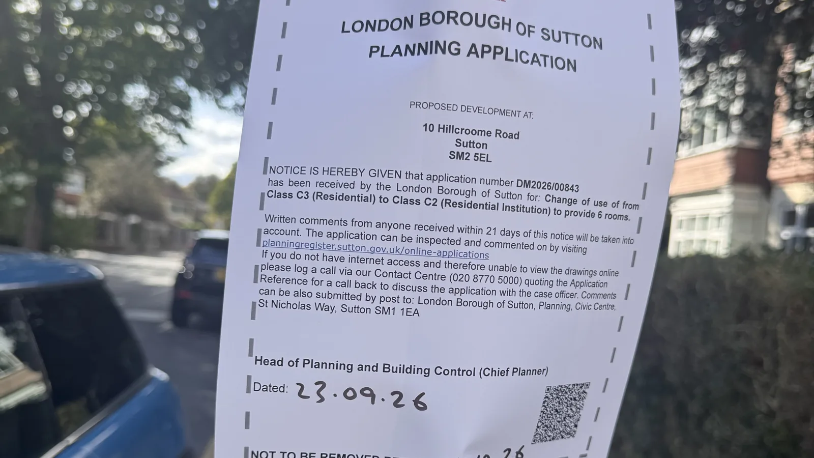 The council's site notice for application DM2026/00843 on Hillcroome Road, Sutton.